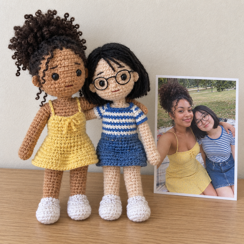 Crochet portrait of Zoe and Nadia, best friends, next to the printed photo it was made from